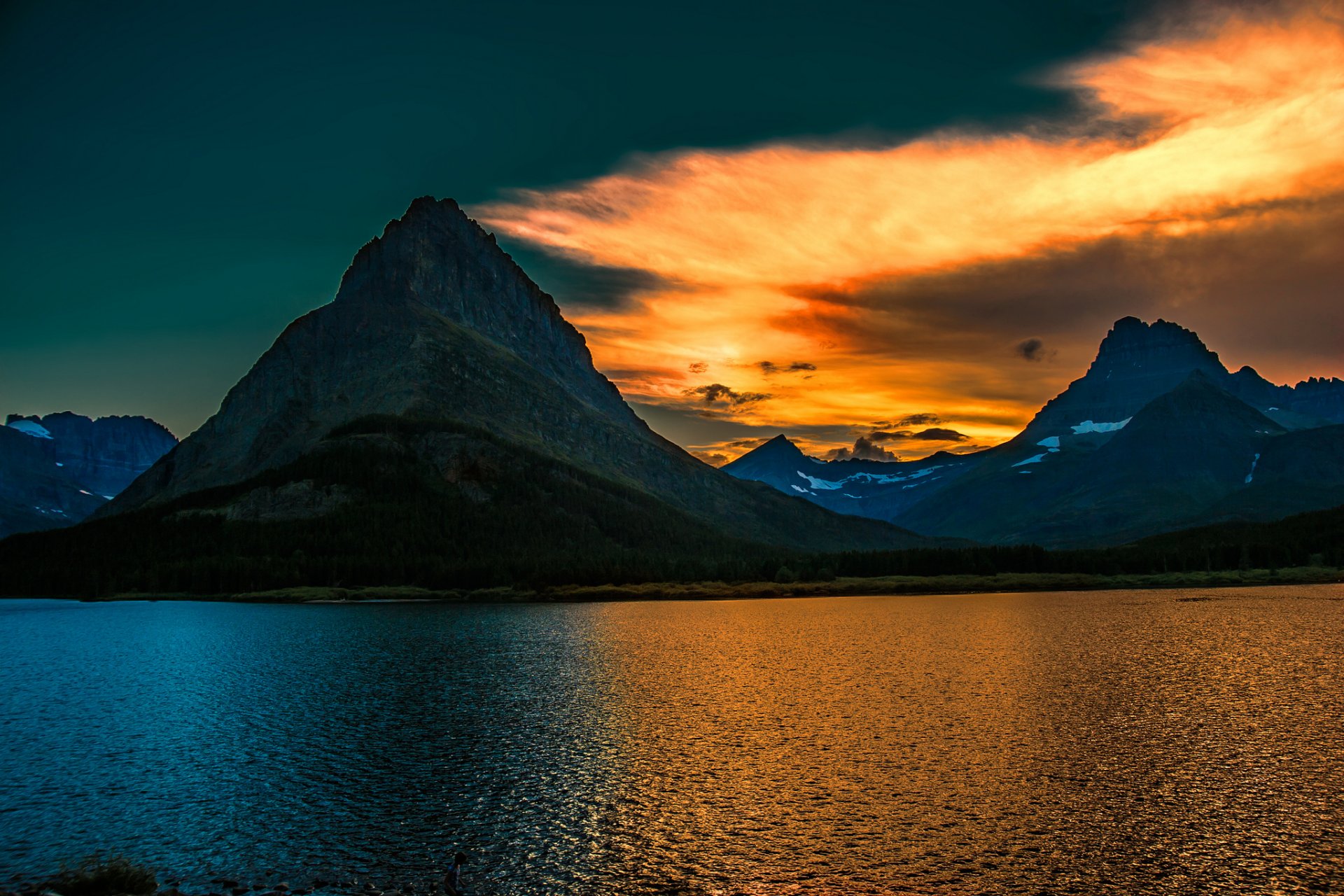 sonnenaufgang glacier national park montana swiftcurrent see grinnell peak berge see morgen park montana