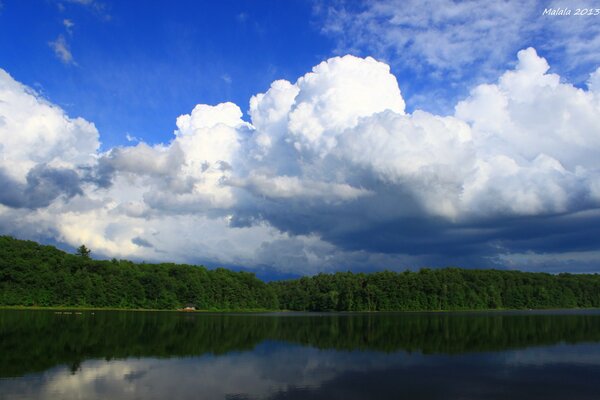 The purest water, green forest, white clouds that s nature