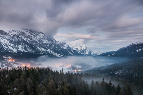 The Dolomites. Forest. Snow