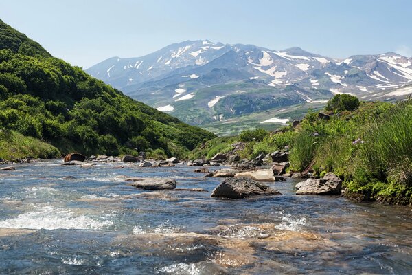 Title a stream flowing downstream over rocks