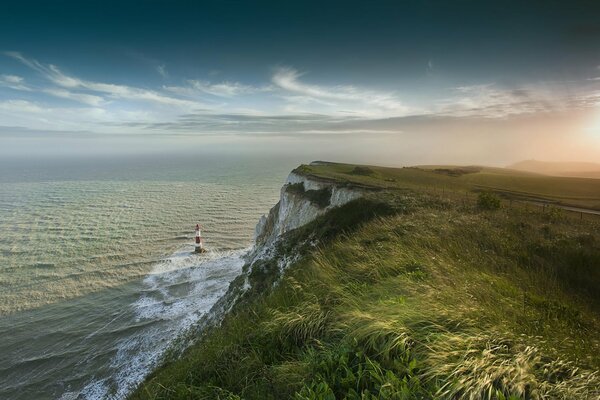 Nature, lighthouse in the sea, photo from the height of the mountain