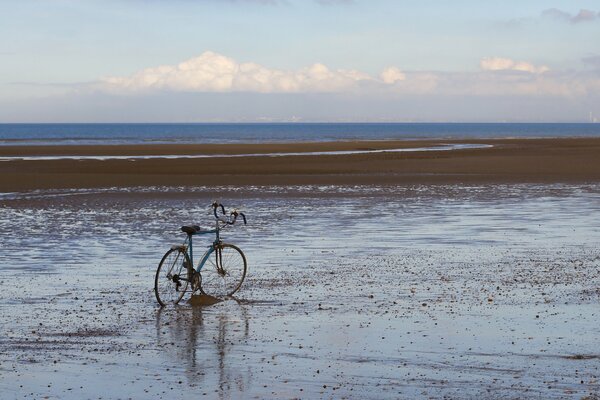 The bike is on the seashore