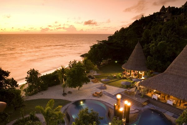 Bungalow houses on the background of sunset