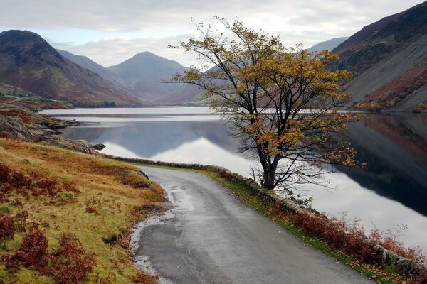 Mountain road with lake