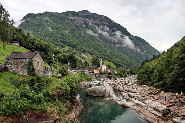 Houses by the rocky mountain river