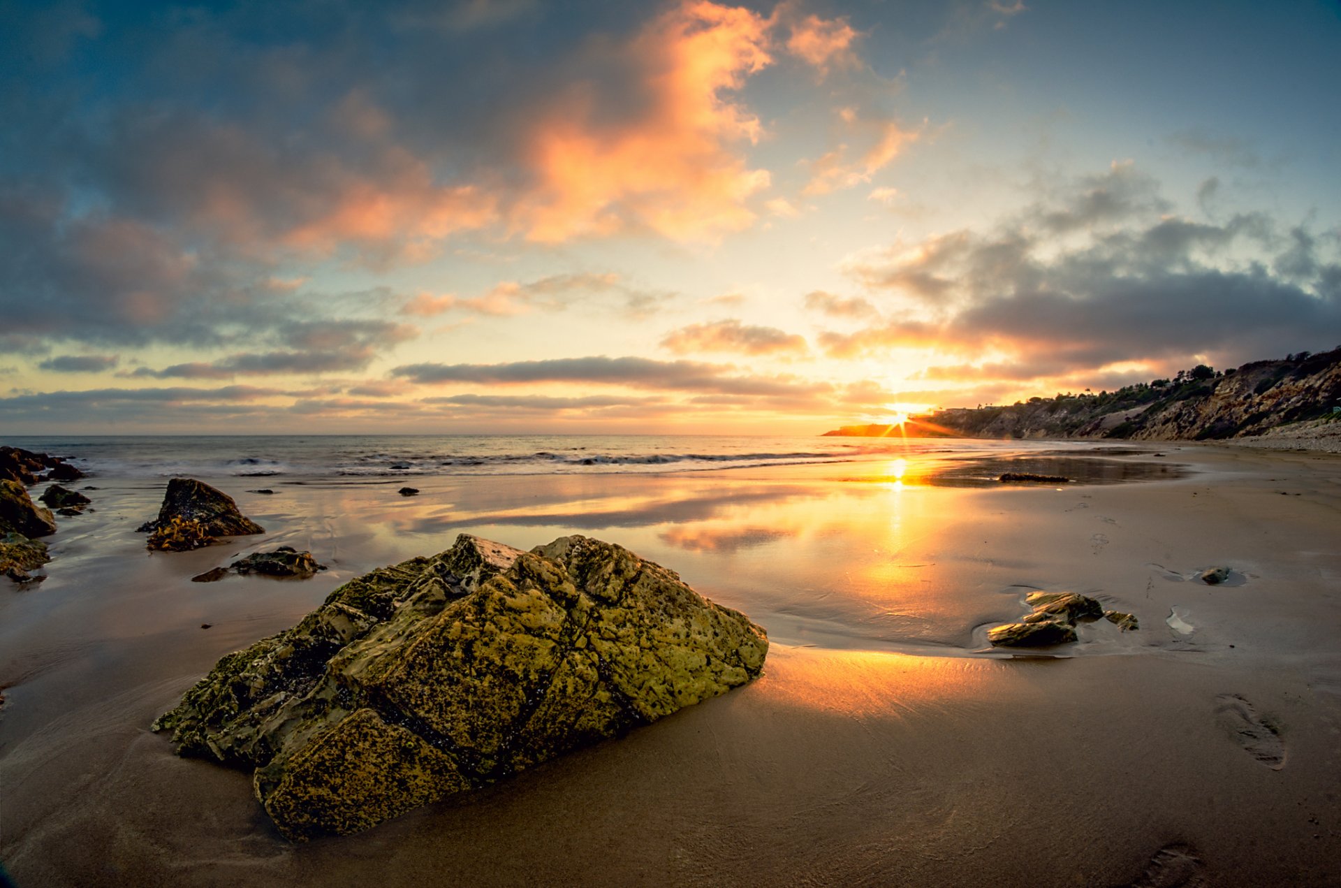 ea beach sand stones sunset