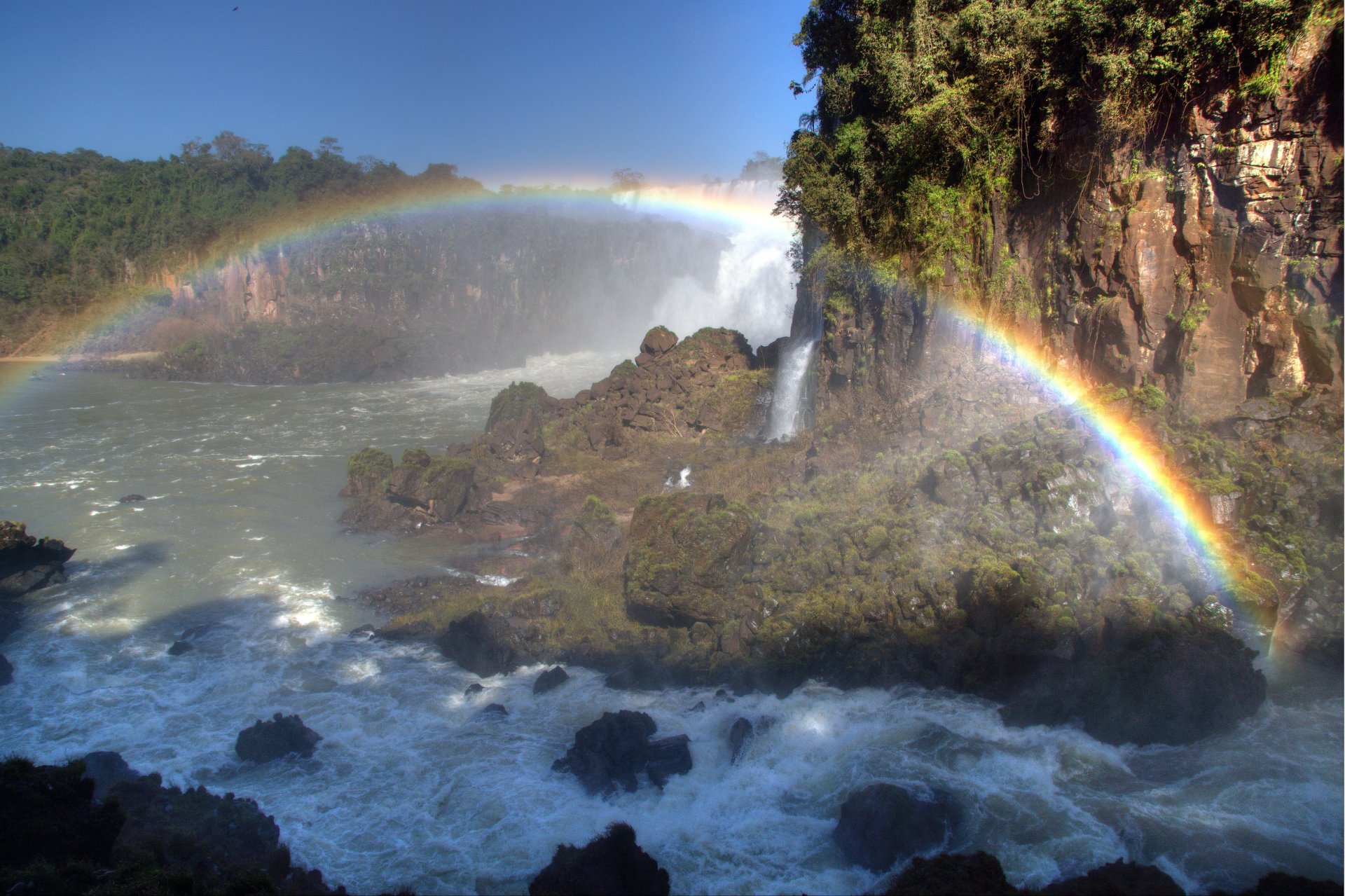 argentina waterfalls iguazu high water feed spray rainbow is considered the eighth wonder of the world