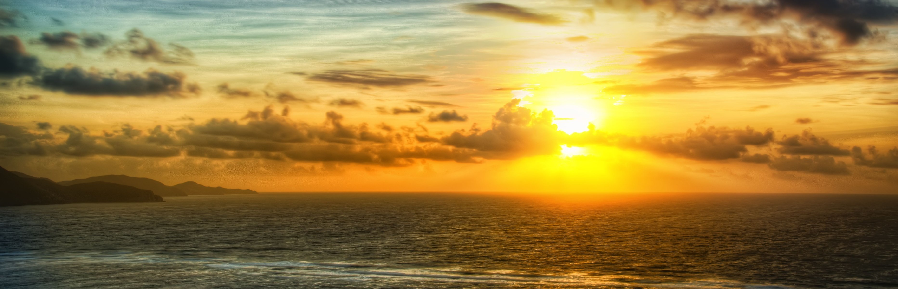 meer felsen sonne himmel wolken