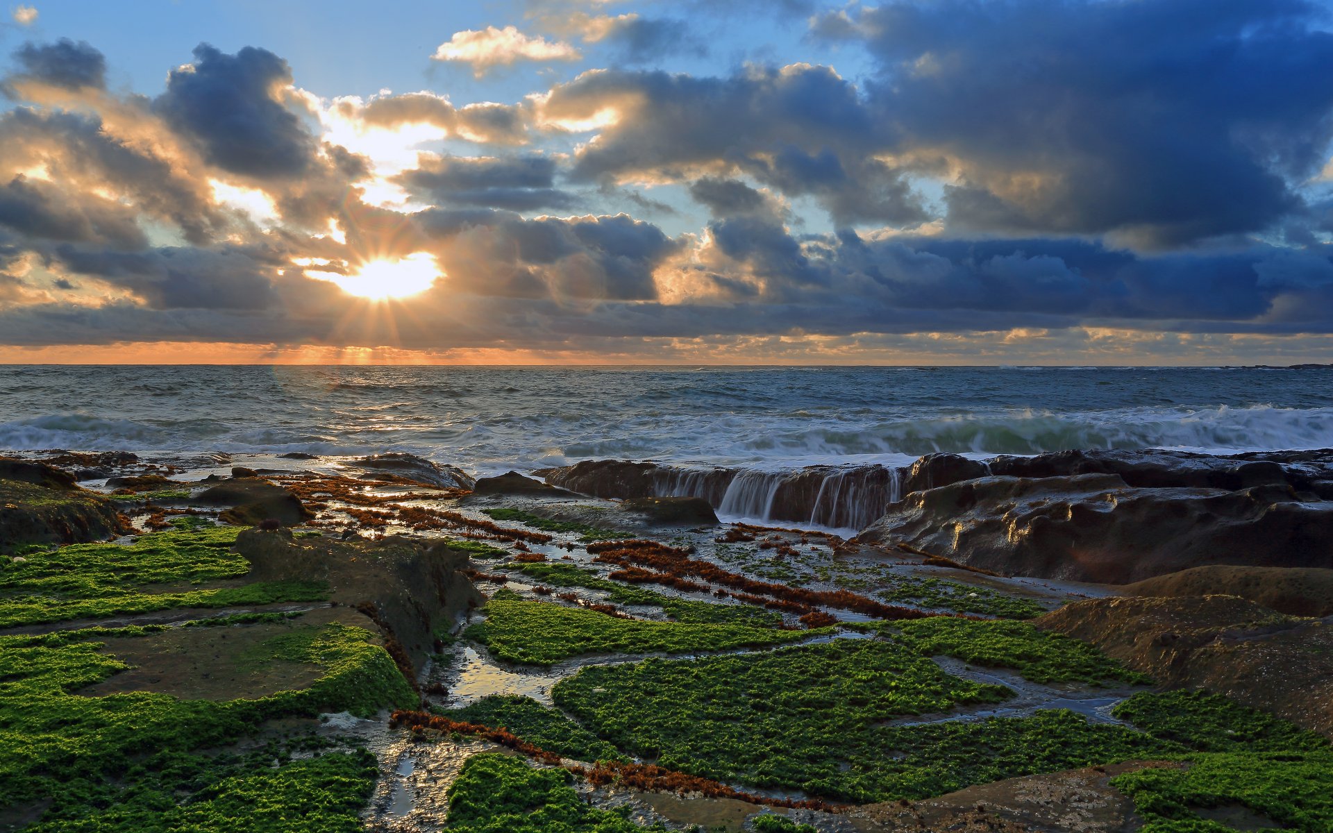 océano pacífico puesta de sol rocas nubes costa