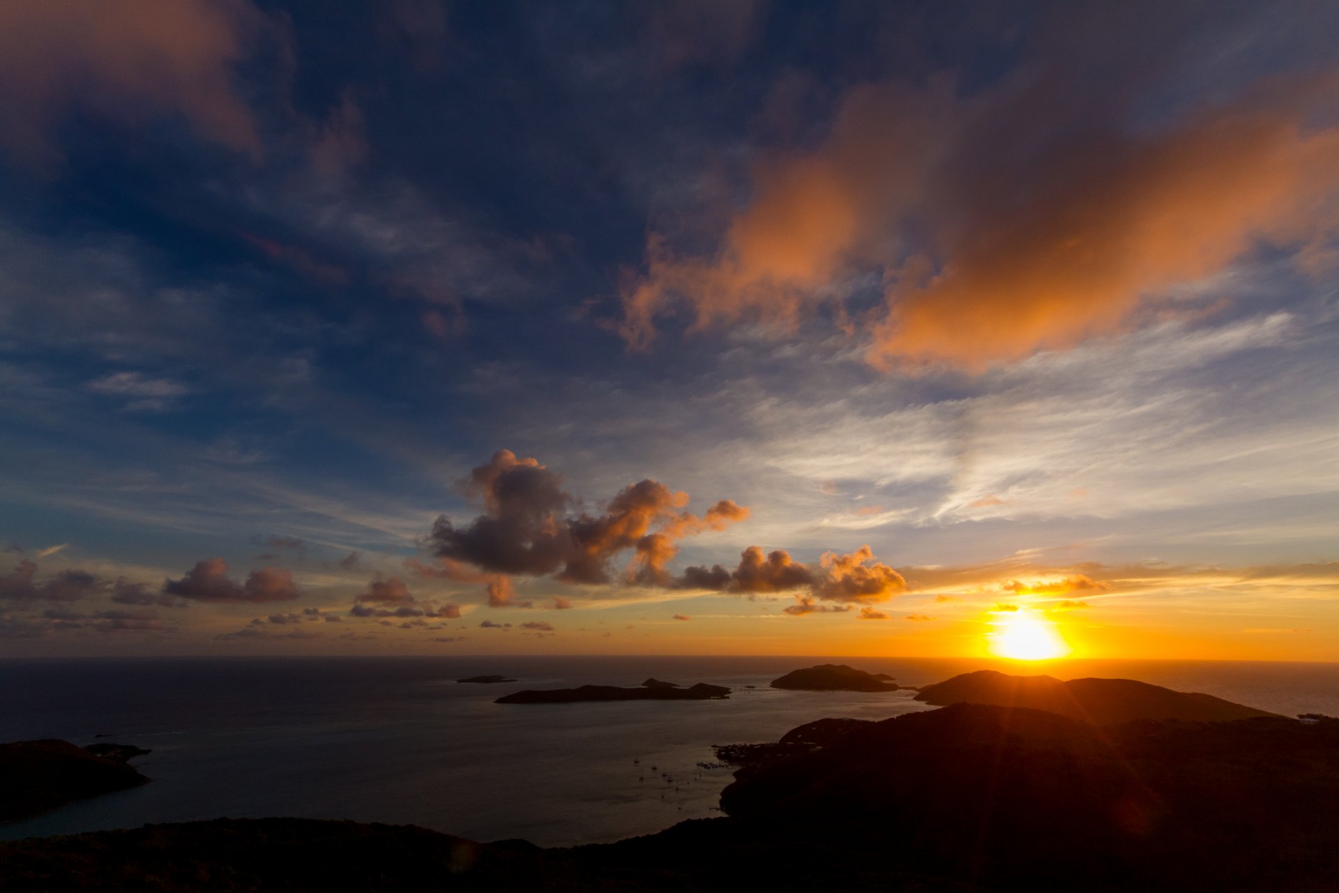 unset evening sea boats islets horizon