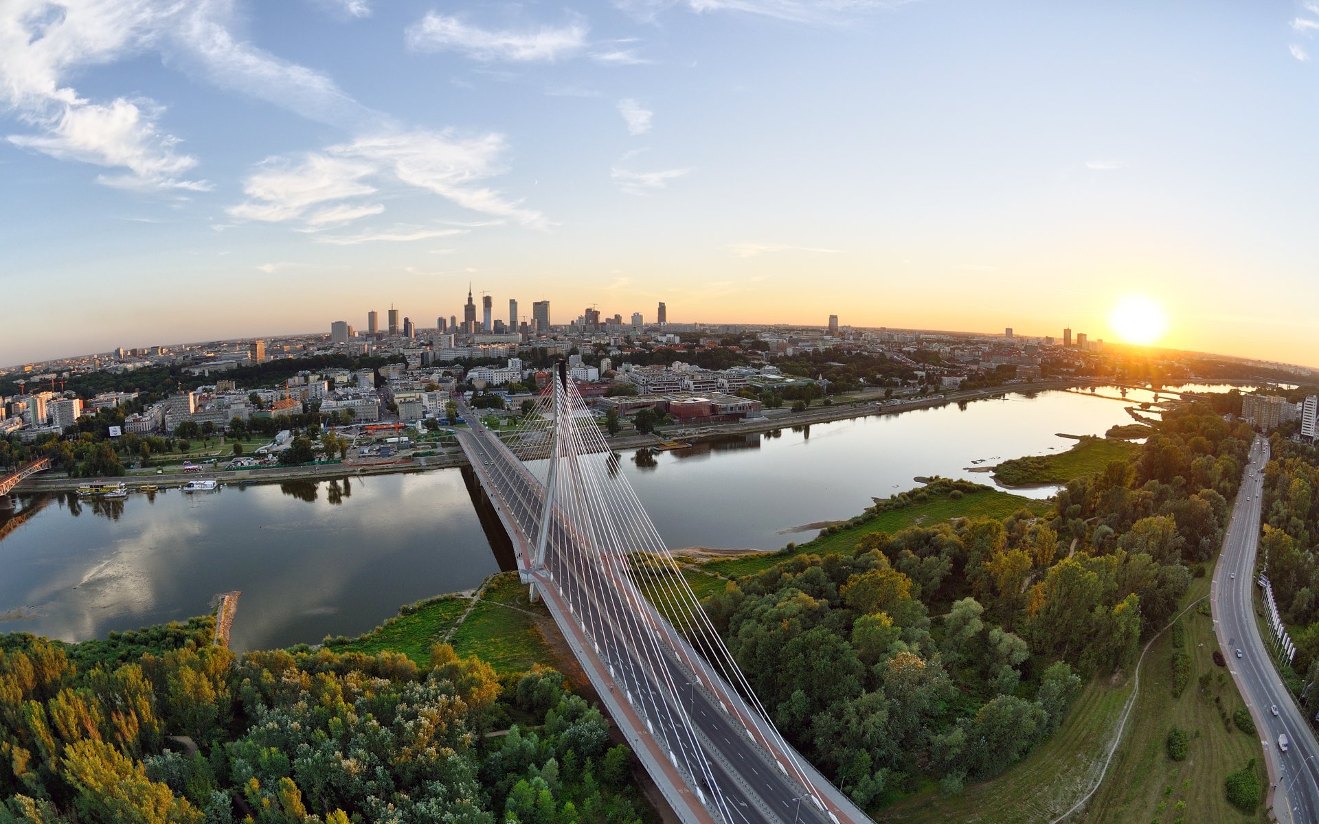 warschau stadt brücke fluss weichsel straße himmel sonnenuntergang häuser stütze horizont sonne wald bäume