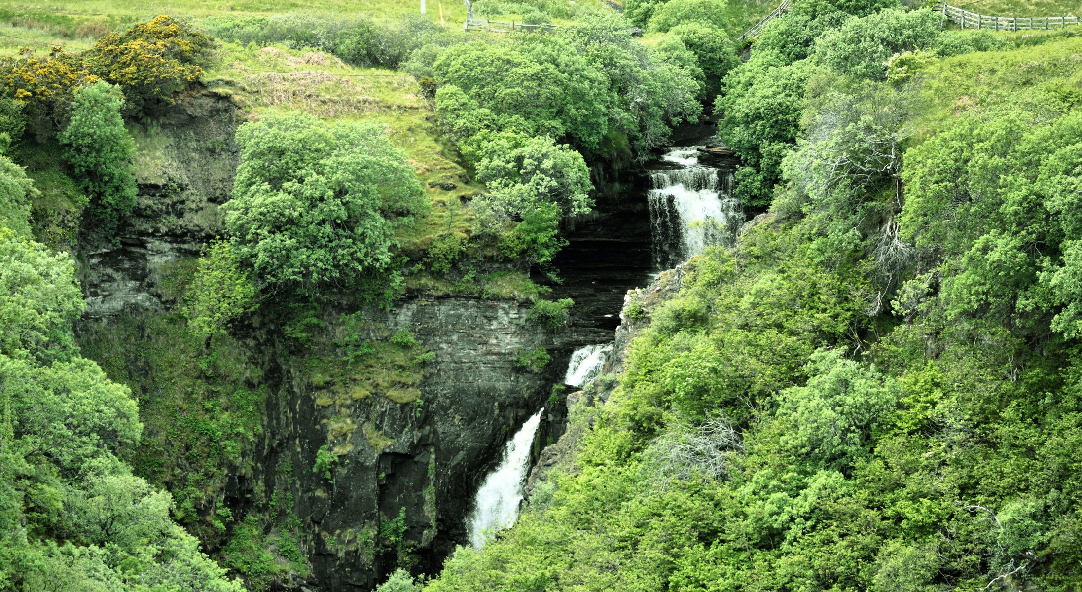 waterfall isle of skye scotland water feed rock grass bush