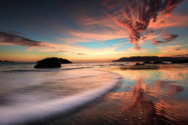 Summer landscape under a pink sky