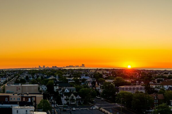 Sunset from the height of city roofs