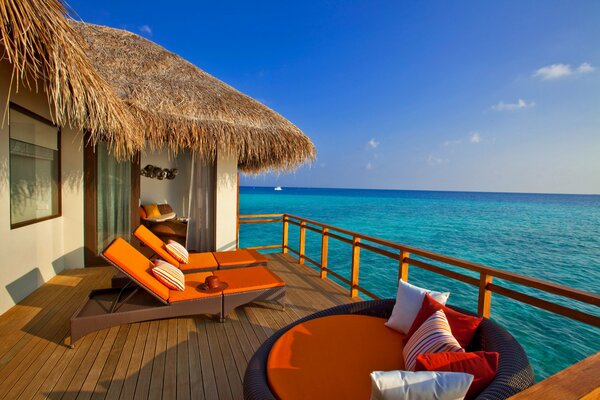 Bungalow terrace on the background of the sea