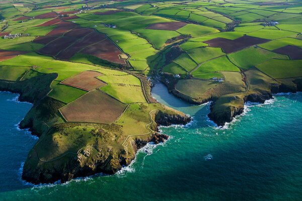 Fields by the sea at the edge of the earth