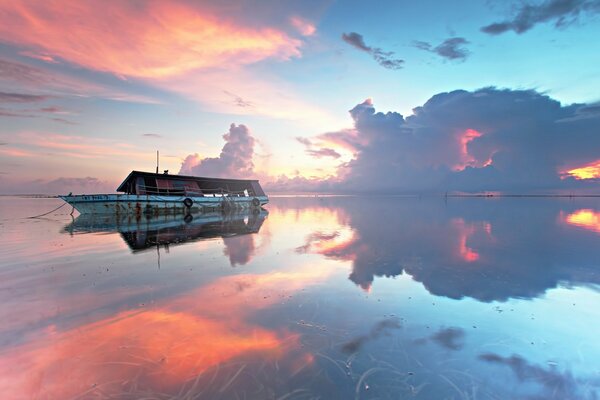 On the ship closer to the sunset to sit and watch how good it is