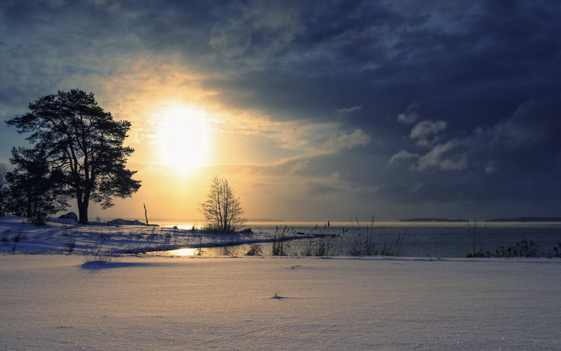 sonnenuntergang see winter landschaft