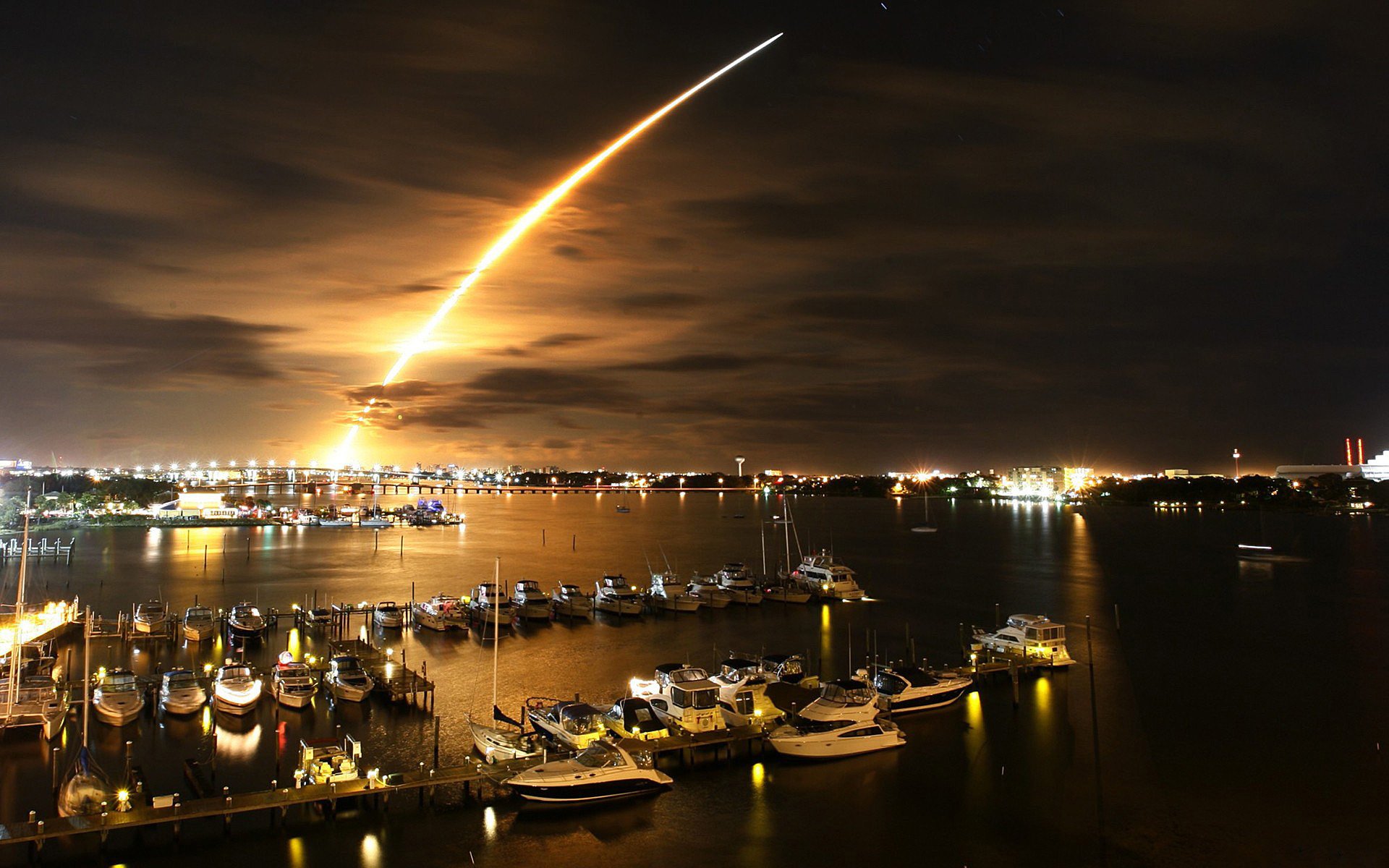 fiery trail yacht night pier