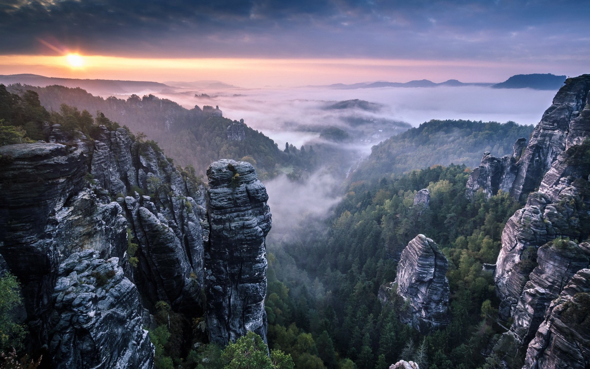 rocks saxon switzerland clouds fog landscape