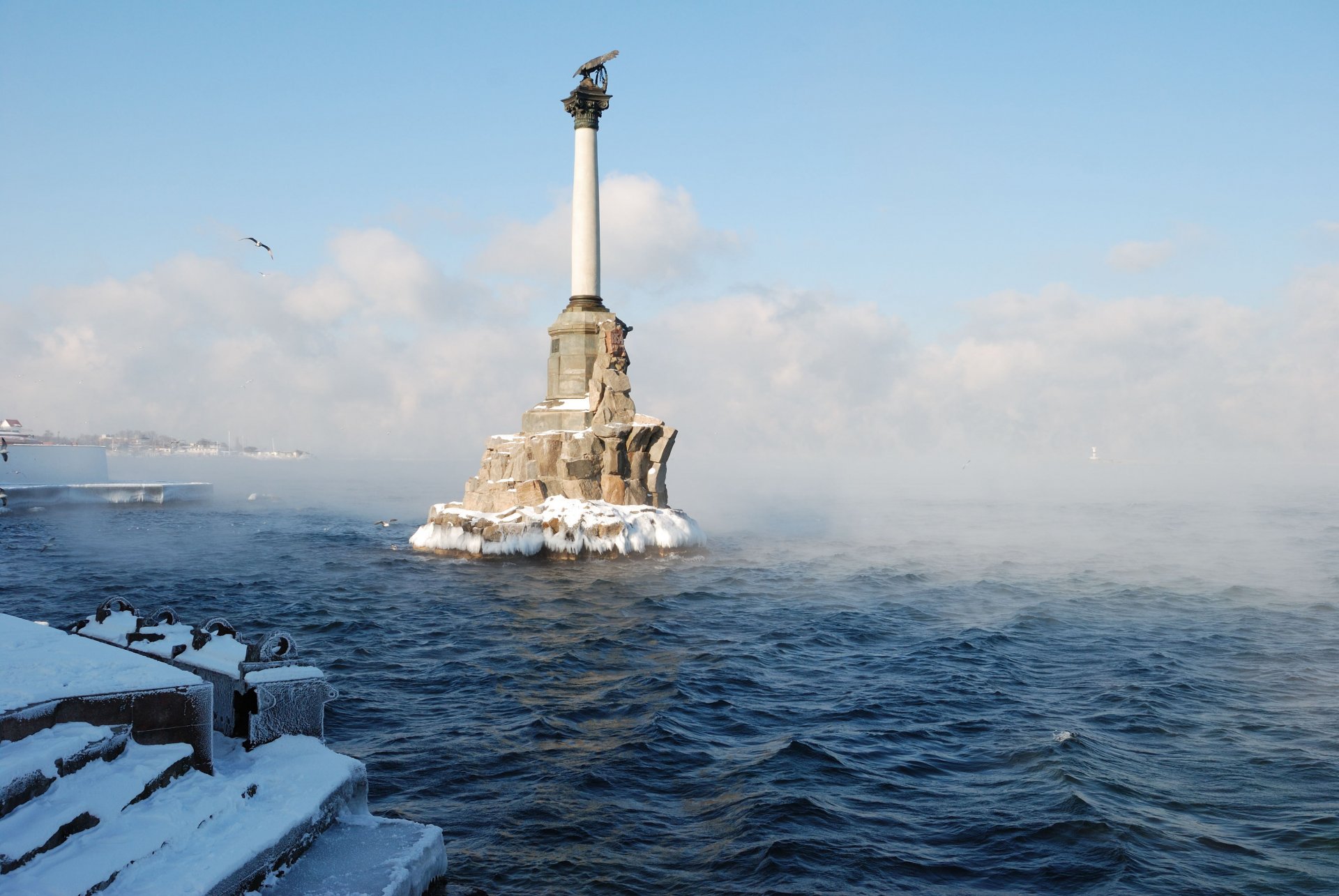 evastopol town hero water monument of sunken ships winter snow embankment freshness fog clouds crimea russia