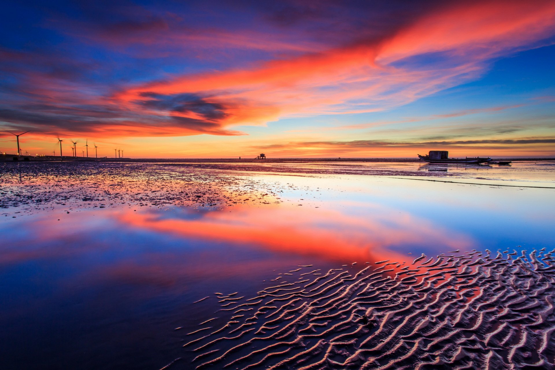 puesta de sol mar molinos de viento paisaje