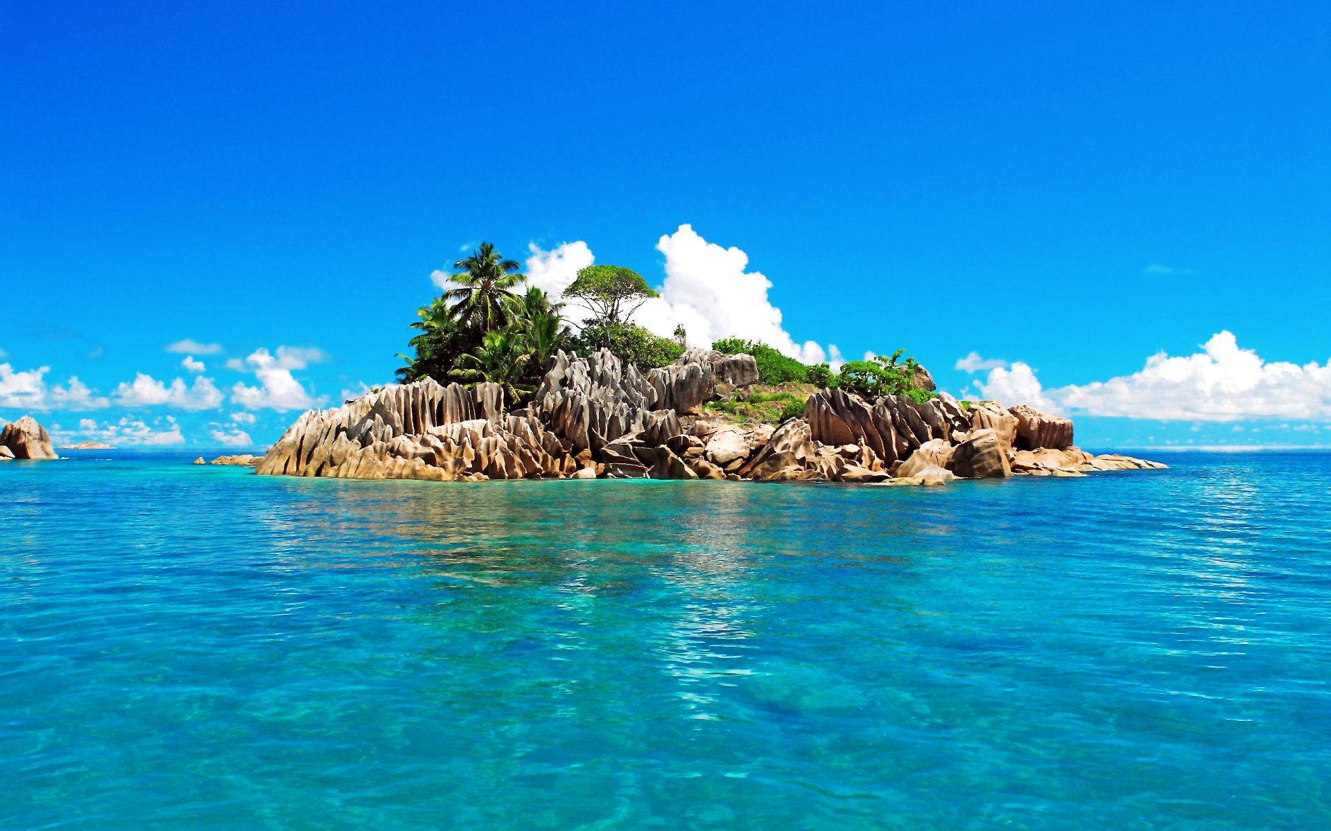 trópicos seychelles cielo nubes mar océano isla palmeras rocas rocas