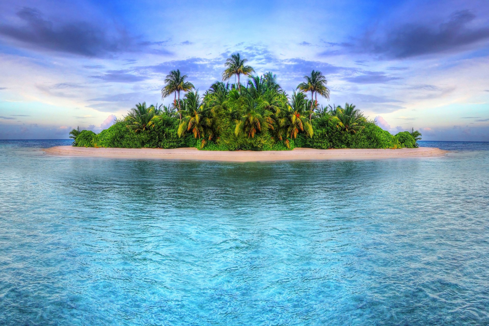 paesaggio natura isolotto spiaggia alberi mare palme cielo