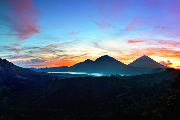 Sunrise from behind the mountains in Indonesia