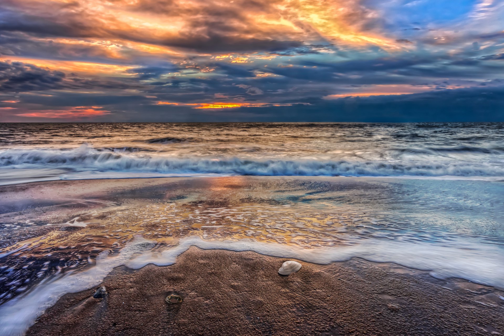 plaża zachód słońca niebo chmury piasek natura krajobraz woda morze ocean chmury