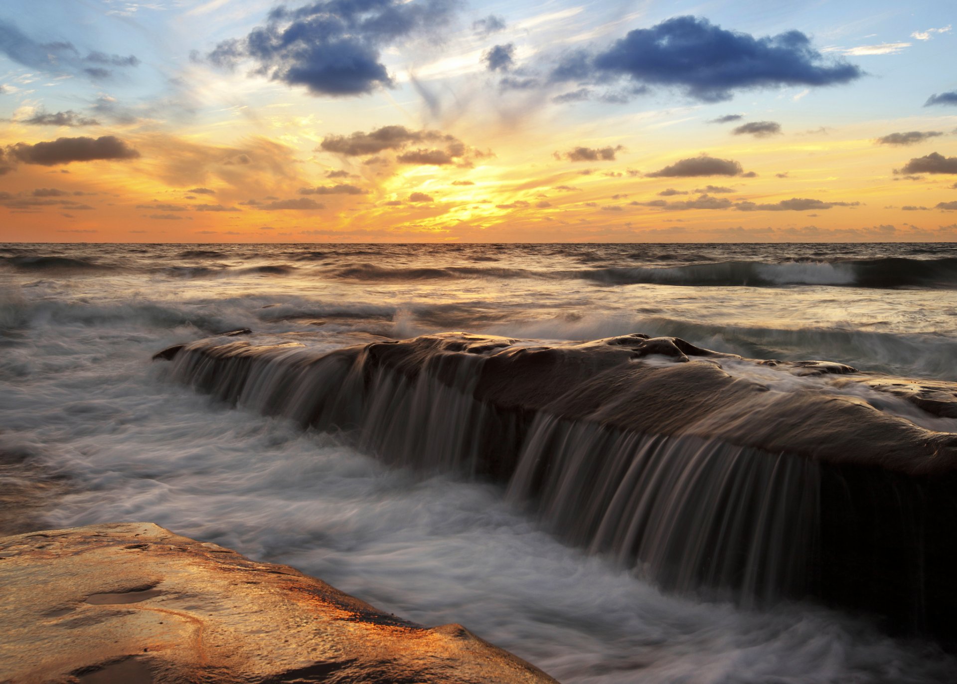 ea ocean sky clouds flows stone