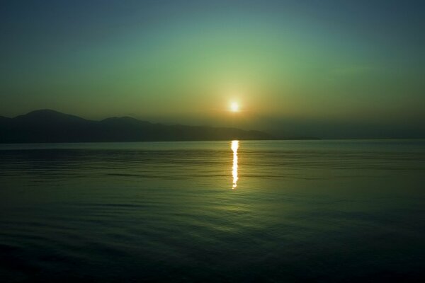 Sunset on the background of the sea