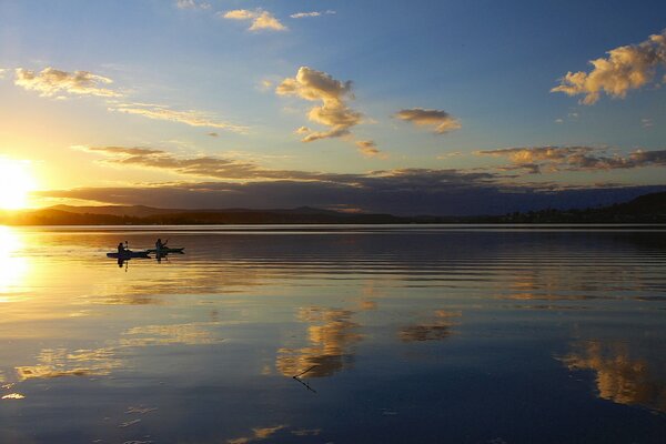 Sunrise over the surface of the water