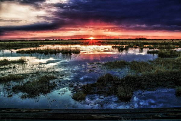 Blue clouds on the horizon at sunset