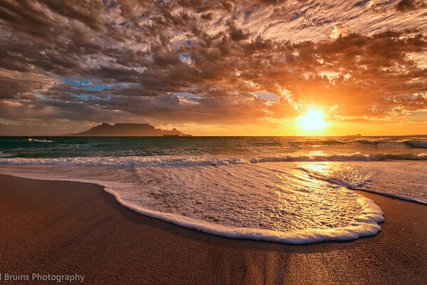 The rolling of a foam wave in the sea