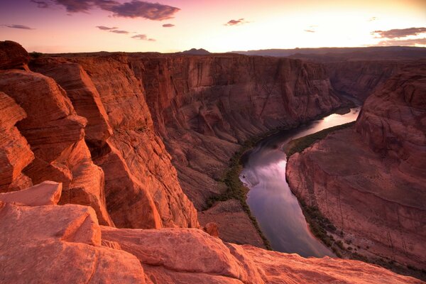 A river among red rocks