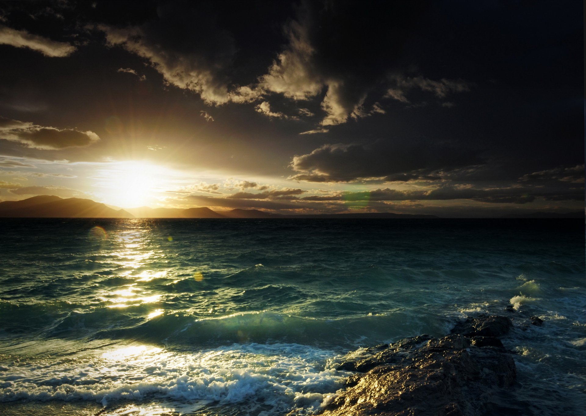 meer berge bucht stein wellen sonne blendung wolken