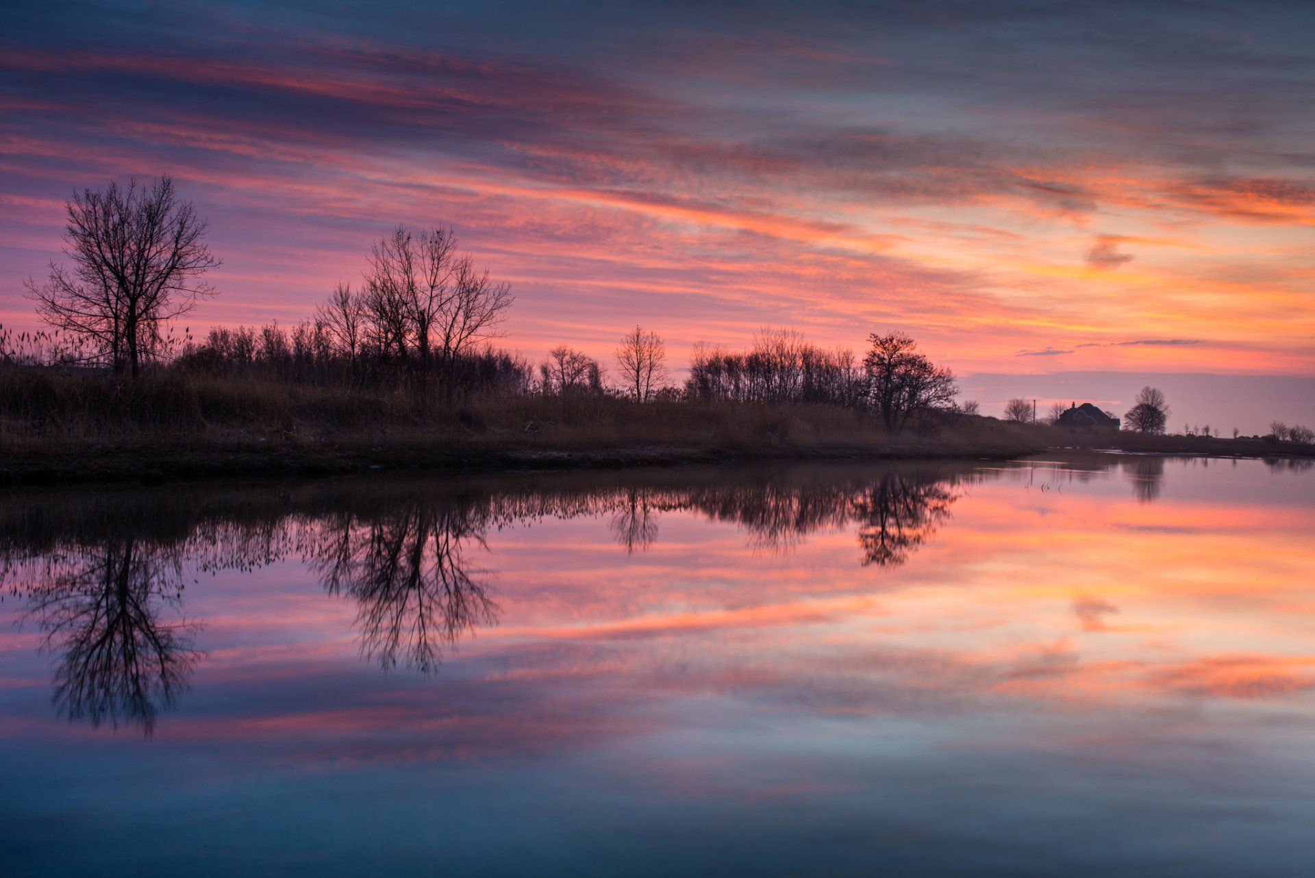 united states connecticut village night twilight sunset sky clouds river water surface of beach tree reflection nature