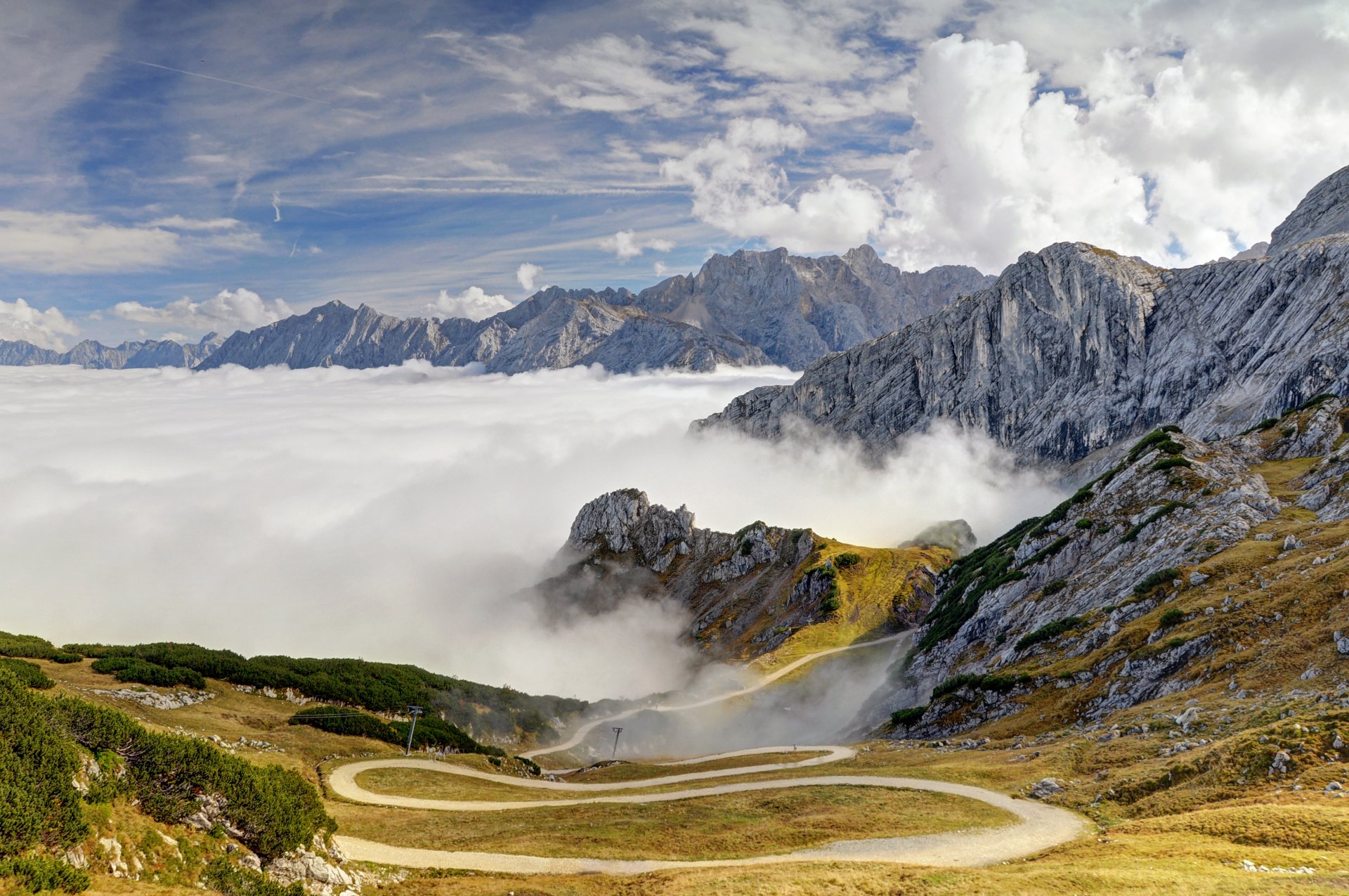 alps mountain tops slopes road tree sky clouds bayern munich germany