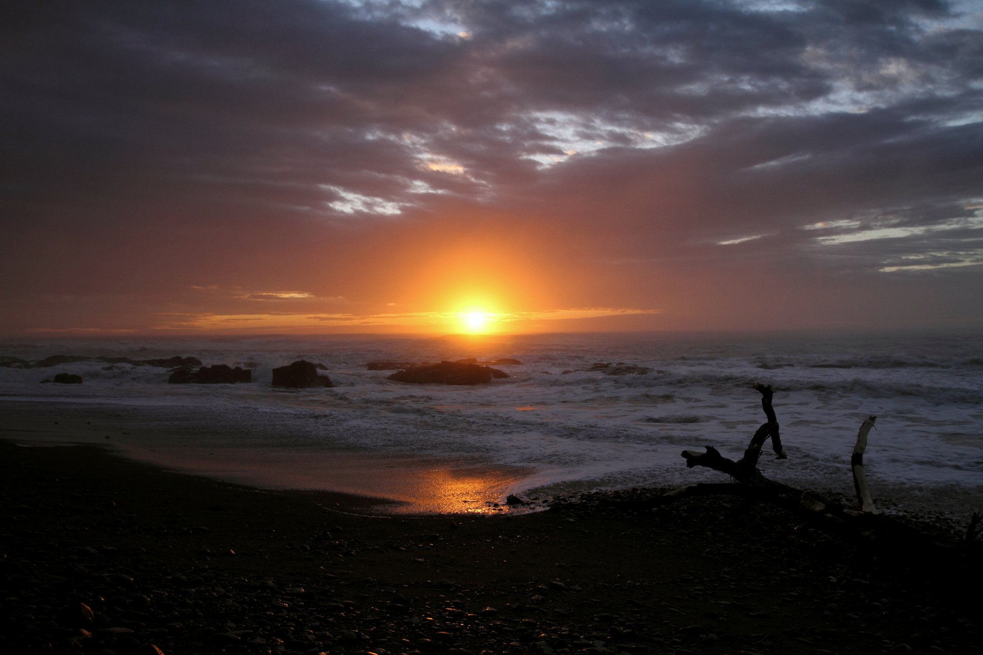 meer strand steine karjang sonne wolken sonnenuntergang