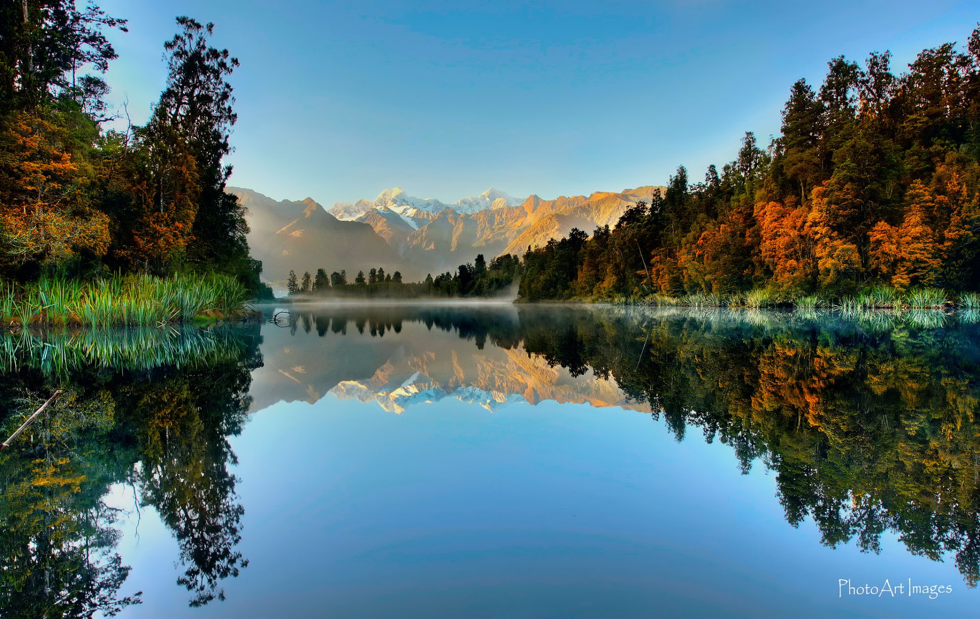 new zealand south island national park westland fox glacier lake matheson lake mountain forest reflection