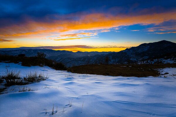 Winter sunset and sparkling snow