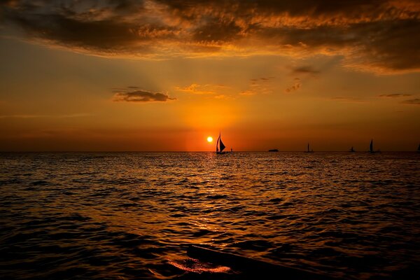 Boat at sunset. Seascape