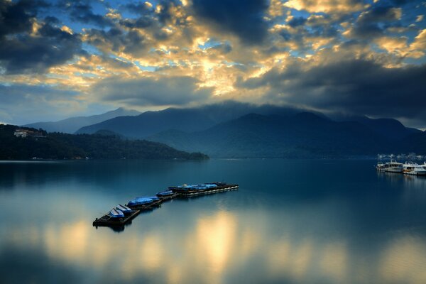 Clouds float over the mountains and the bay