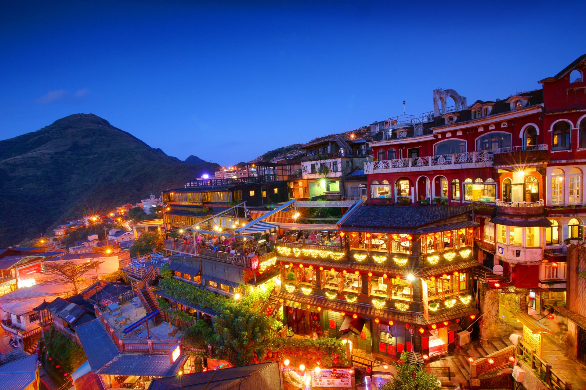 taiwan new taipei city jioufen taipei suburbs houses lighting mountain night blue sky