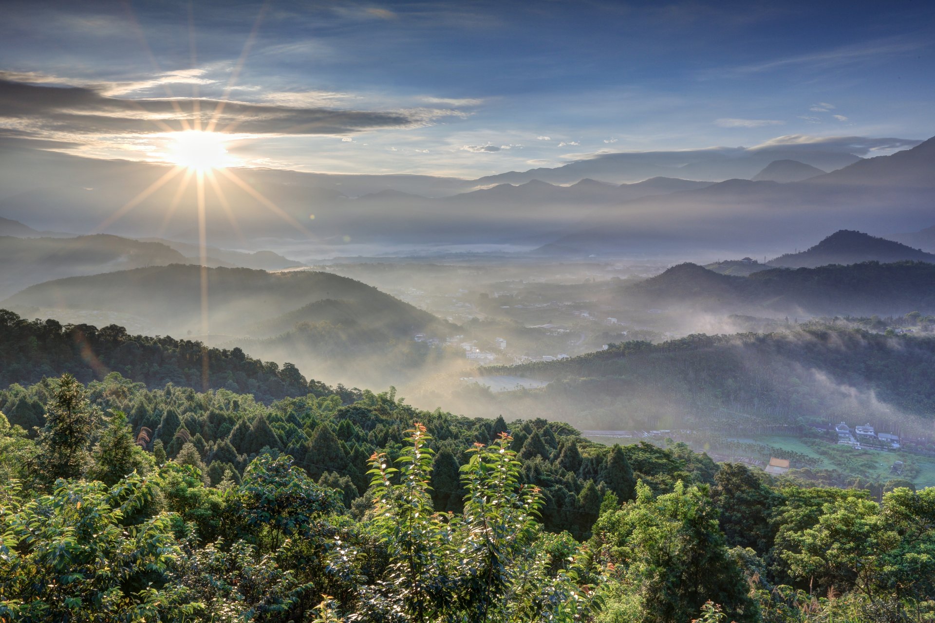 mountain forest tree sky clouds sun sunrise ray