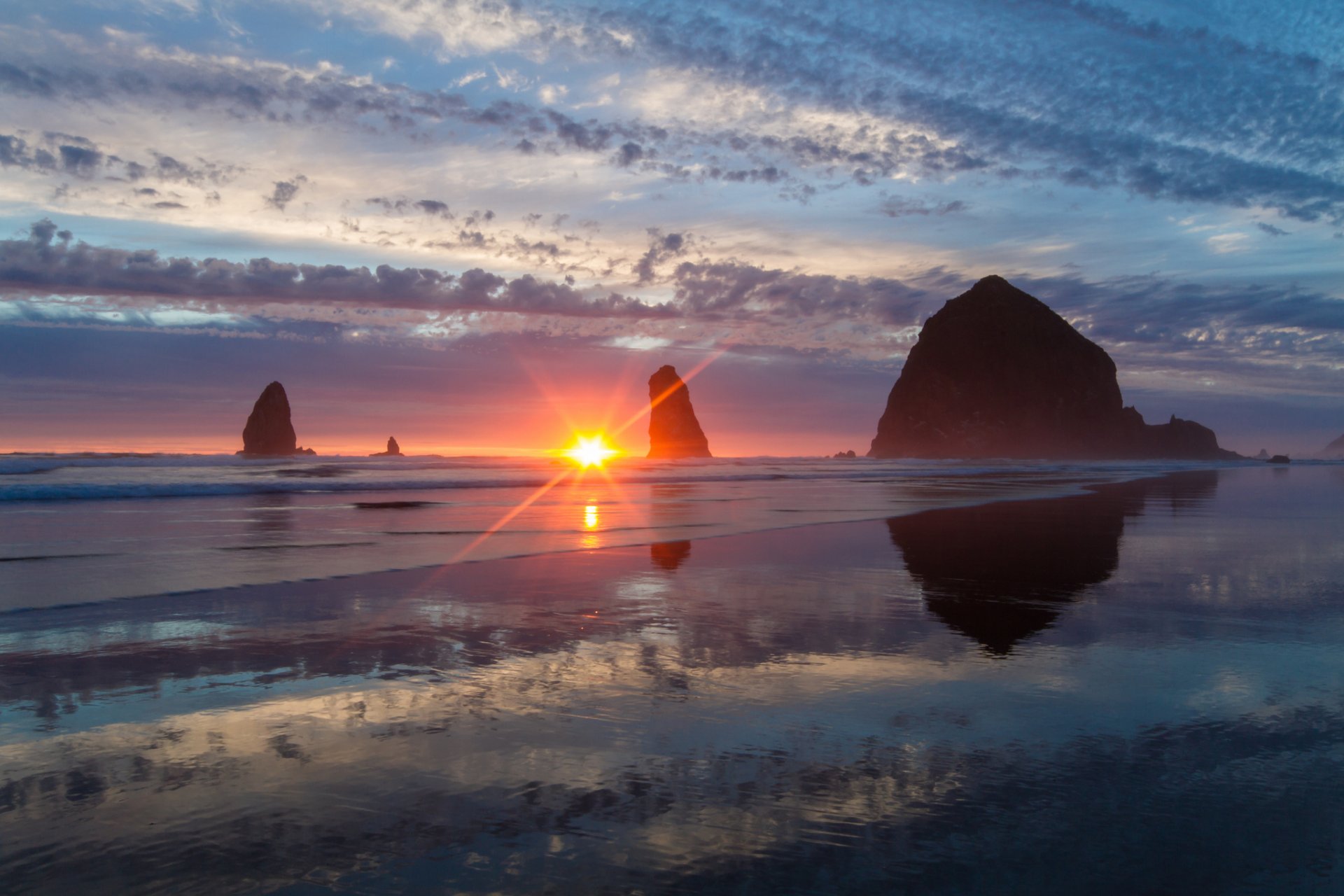 pajar rock cannon beach oregon océano pacífico rocas puesta de sol costa