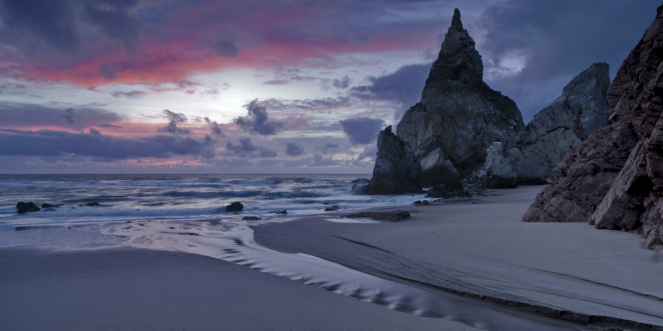 portogallo mare costa sabbia surf rocce sera crepuscolo tramonto cielo nuvole nuvole