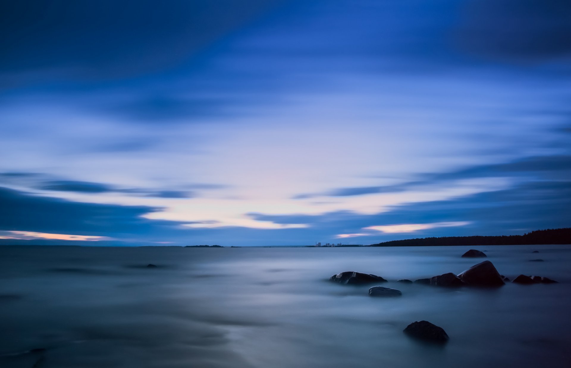 schweden karlstad see ufer steine abend himmel wolken blau