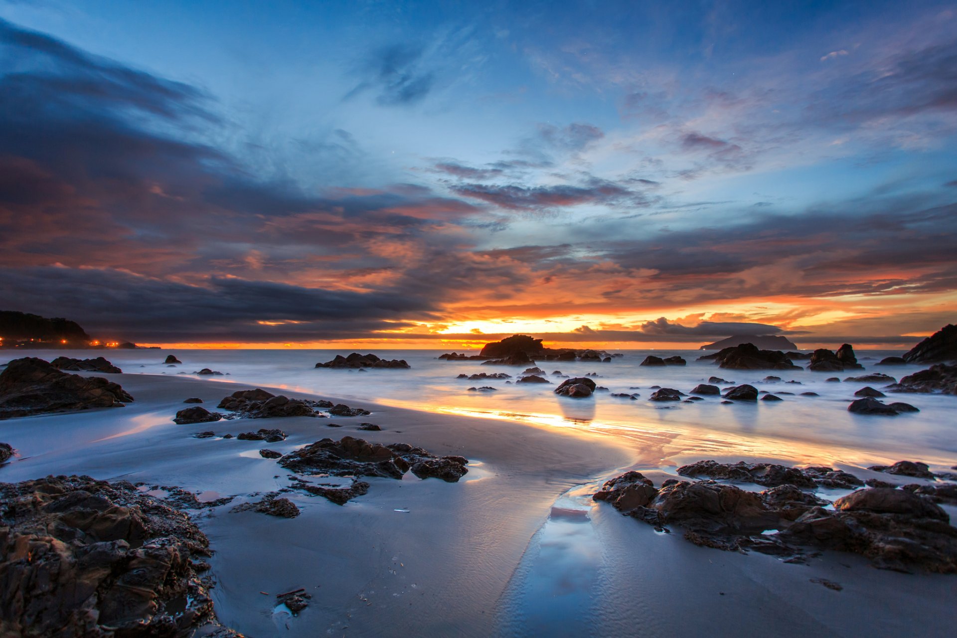 australia costa costa rocce sabbia oceano sera arancione tramonto blu cielo nuvole nuvole